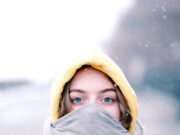 Say Goodbye to Dry Winter Skin woman in gray hijab and black and white coat