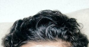 A man with a facial mask on his face