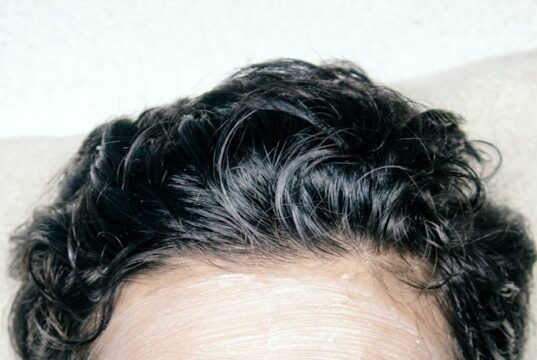 A man with a facial mask on his face