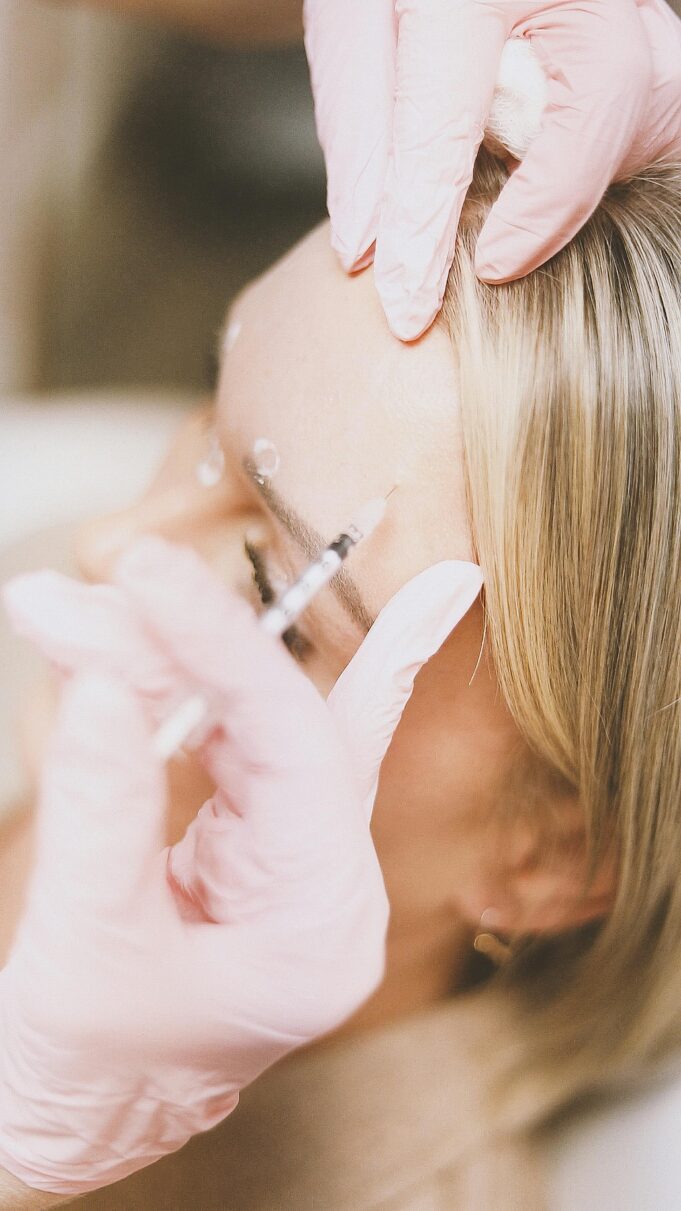 pexels-prolificpeople-34220536 Why Treating "Just the Forehead" Backfires