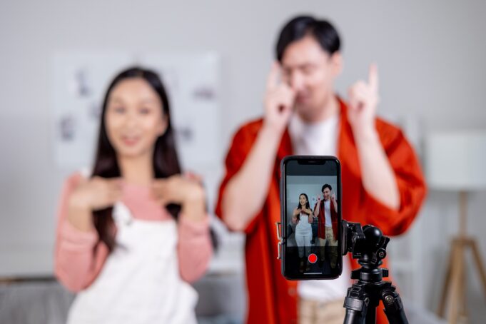 Asian,Young,Couple,Content,Creator,Creating,Their,Dancing,Video,With Why TikTok and Instagram Couple Trends Keep Going Viral